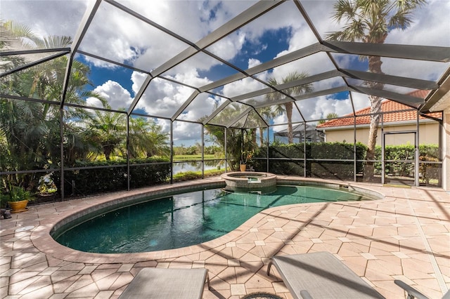 view of swimming pool featuring a patio area, an in ground hot tub, a water view, and glass enclosure