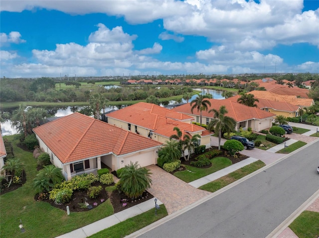 bird's eye view with a water view