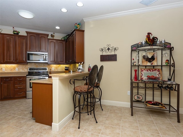 kitchen with stainless steel appliances, light tile patterned flooring, tasteful backsplash, light stone countertops, and crown molding