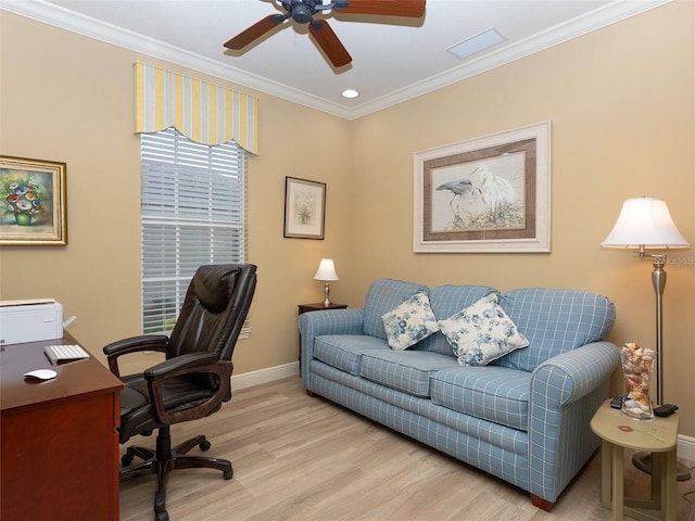 office space featuring ceiling fan, light hardwood / wood-style floors, and crown molding