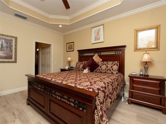 bedroom featuring ceiling fan and crown molding