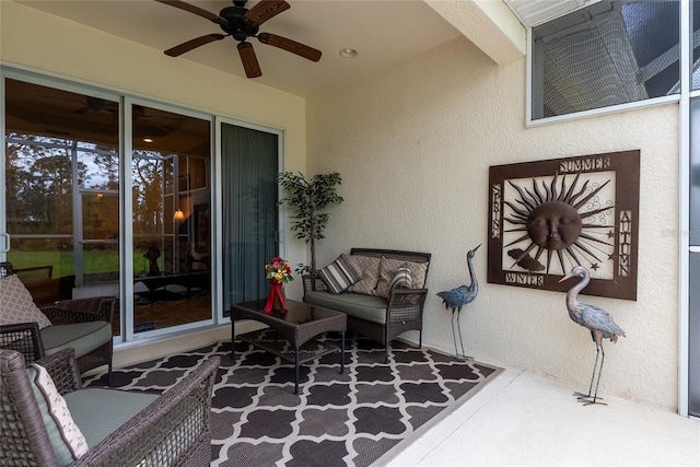 exterior space featuring ceiling fan