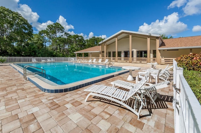 view of swimming pool featuring a patio