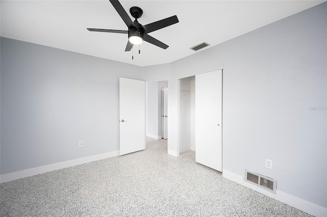 unfurnished bedroom featuring ceiling fan