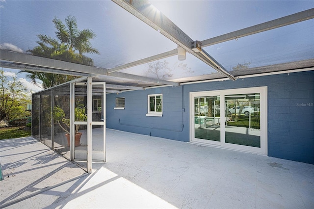 view of patio / terrace with glass enclosure