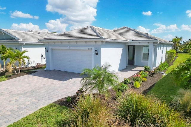 view of front of property featuring a garage