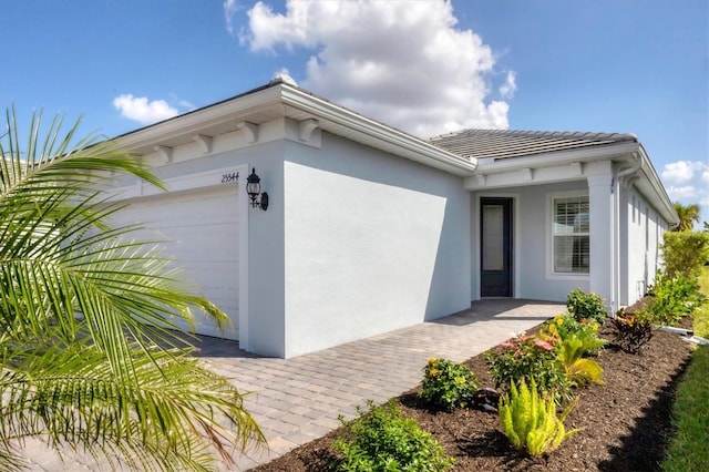 property entrance with a garage