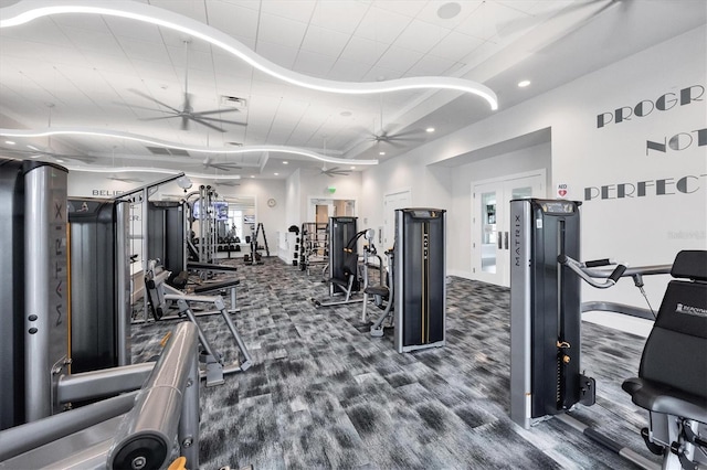 workout area with carpet floors and ceiling fan