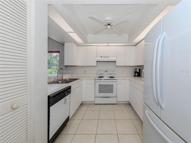 kitchen featuring custom range hood, white appliances, sink, light tile patterned floors, and white cabinetry