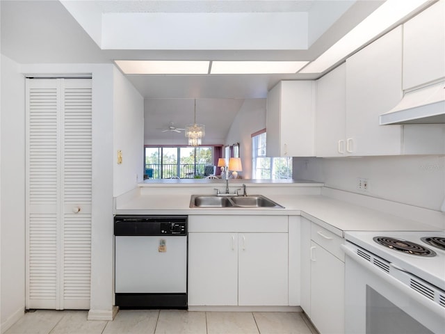 kitchen with white cabinetry, white appliances, and sink