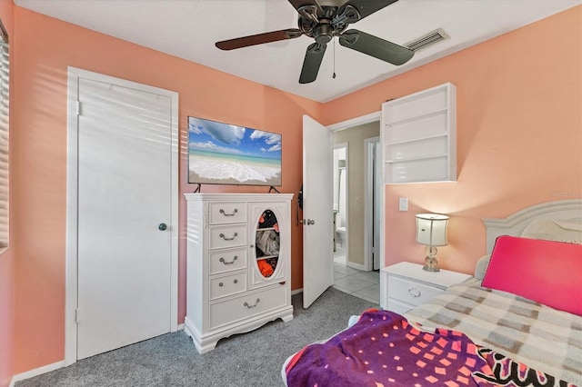 carpeted bedroom with ceiling fan