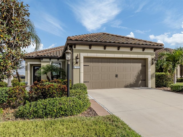 view of front of property with a garage