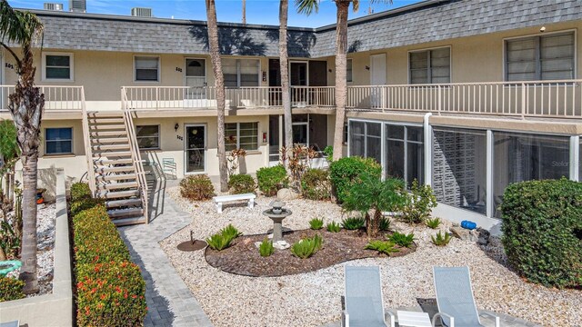 200 Park Blvd N Unit 103, Venice, FL 34285 - view of building exterior featuring stairway