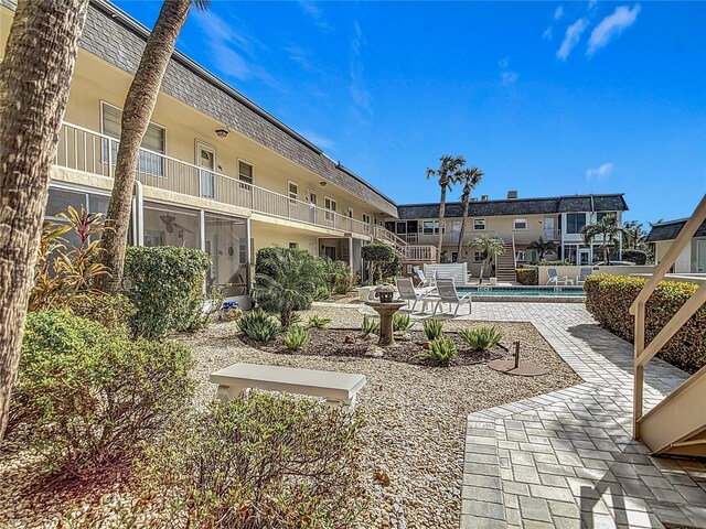 200 Park Blvd N Unit 103, Venice, FL 34285 - view of home's community featuring a swimming pool and a patio area