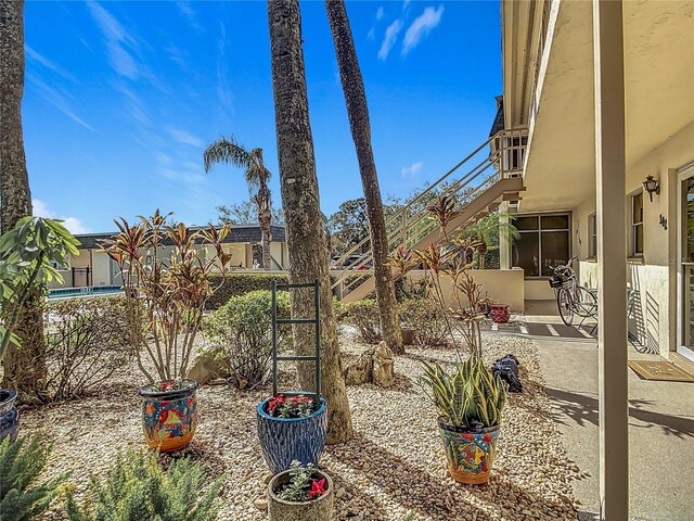 200 Park Blvd N Unit 103, Venice, FL 34285 - view of yard featuring fence and a patio