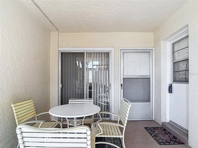 200 Park Blvd N Unit 103, Venice, FL 34285 - doorway to property with stucco siding