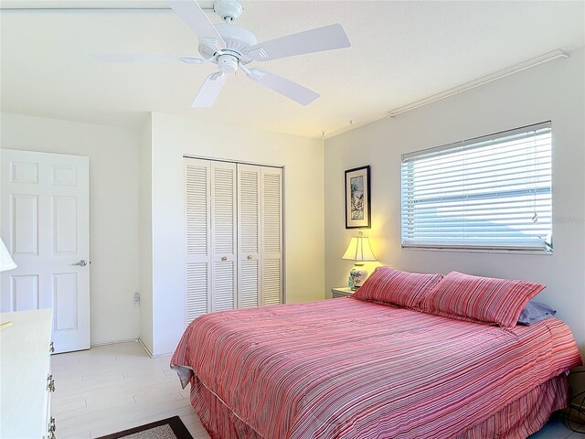 200 Park Blvd N Unit 103, Venice, FL 34285 - bedroom featuring a closet and a ceiling fan