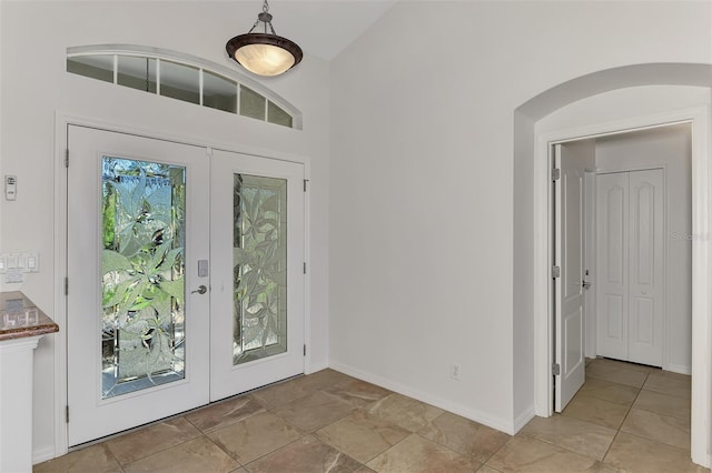 1219 Nantucket Rd, Venice, FL 34293 - foyer entrance featuring baseboards and high vaulted ceiling