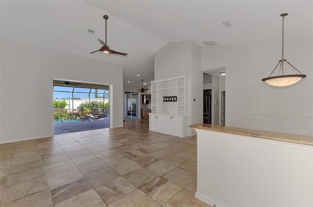 1219 Nantucket Rd, Venice, FL 34293 - kitchen with a ceiling fan, high vaulted ceiling, decorative light fixtures, white cabinets, and light countertops