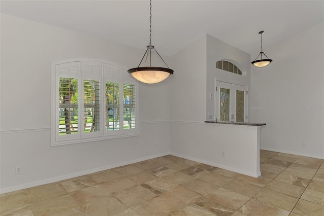 1219 Nantucket Rd, Venice, FL 34293 - unfurnished dining area featuring baseboards