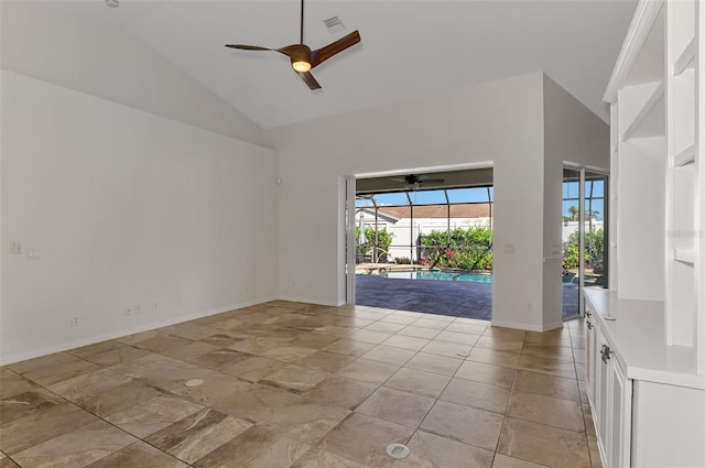 1219 Nantucket Rd, Venice, FL 34293 - unfurnished room featuring a ceiling fan, baseboards, high vaulted ceiling, and a sunroom