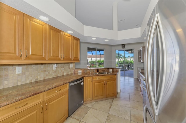1219 Nantucket Rd, Venice, FL 34293 - kitchen featuring stainless steel appliances, a sink, backsplash, light tile patterned flooring, and recessed lighting