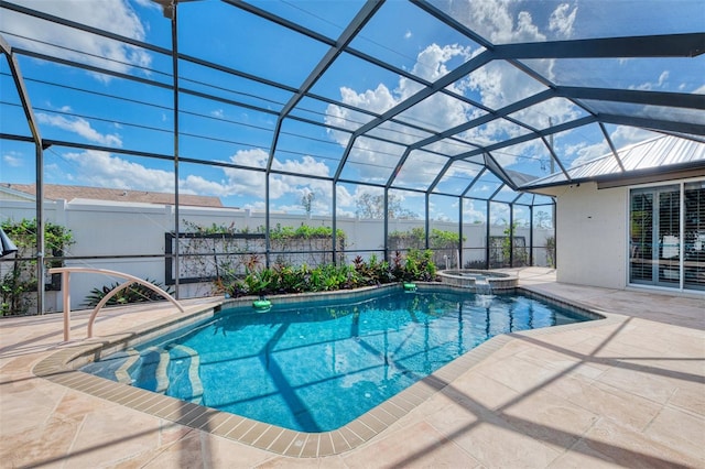 1219 Nantucket Rd, Venice, FL 34293 - view of swimming pool with a patio, a pool with connected hot tub, glass enclosure, and fence