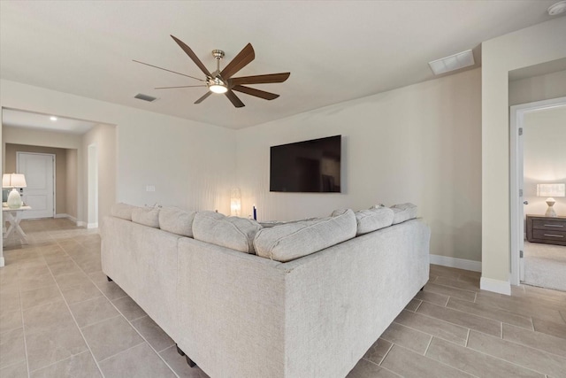 living room with ceiling fan