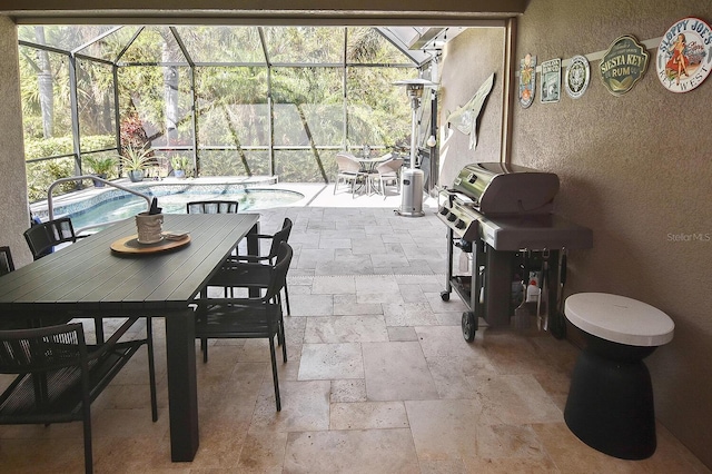 view of patio / terrace with a lanai