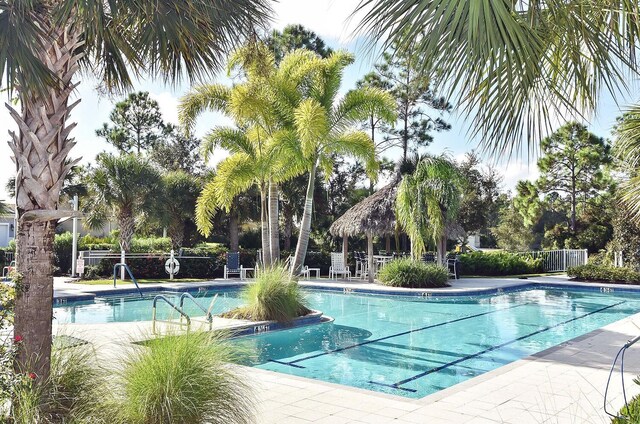 view of pool featuring a patio area