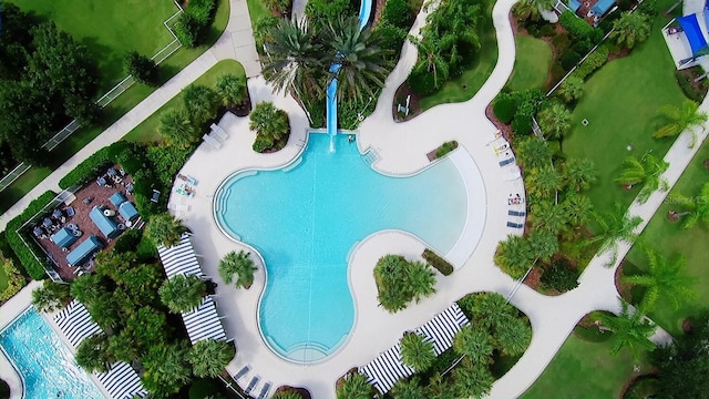 view of swimming pool with a patio area