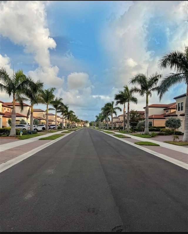 view of street with a residential view and sidewalks