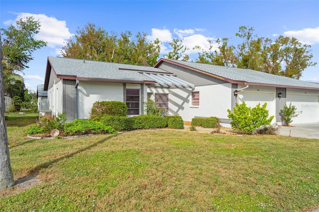 ranch-style home featuring a garage, central AC unit, and a front lawn