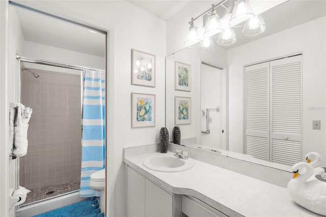 605 Apple Ln, Englewood, FL 34223 - bathroom with a stall shower, vanity, and a closet