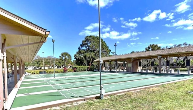 605 Apple Ln, Englewood, FL 34223 - view of community with shuffleboard