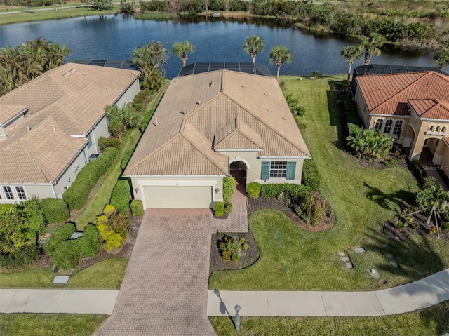 drone / aerial view with a water view