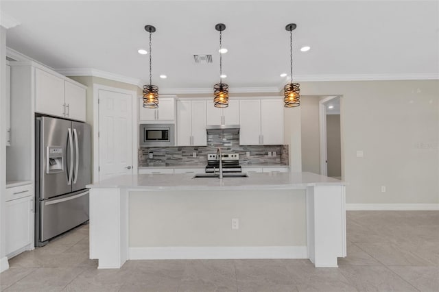 kitchen featuring white cabinets, sink, stainless steel appliances, and a kitchen island with sink