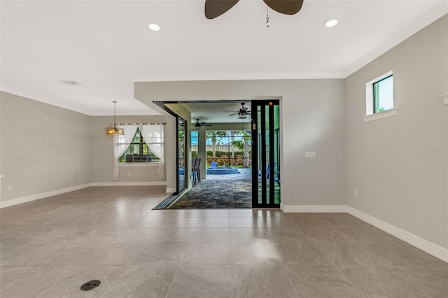 foyer entrance featuring crown molding