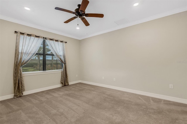 unfurnished room with crown molding and light carpet