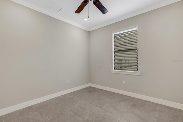 empty room featuring ceiling fan and crown molding