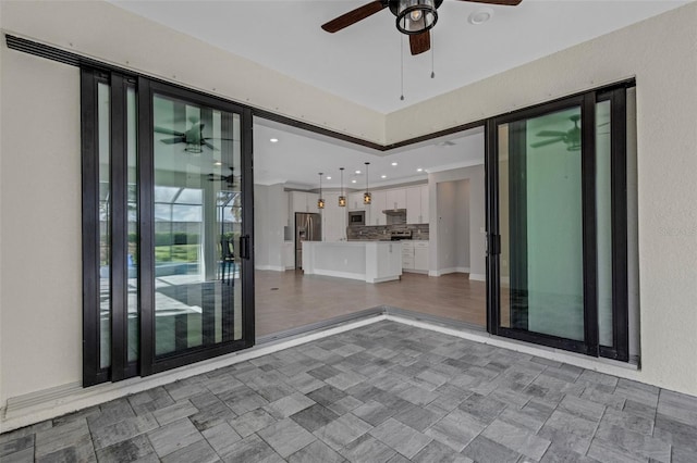 view of patio / terrace with ceiling fan