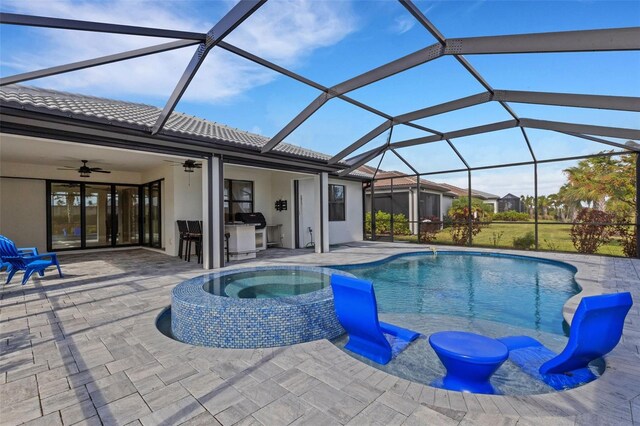 view of pool with ceiling fan, a lanai, an in ground hot tub, and a patio