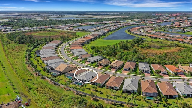 drone / aerial view featuring a water view