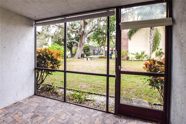 view of unfurnished sunroom