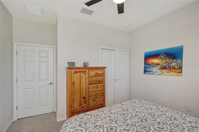 bedroom with light carpet, a closet, and ceiling fan