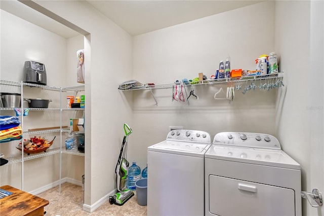 washroom featuring independent washer and dryer