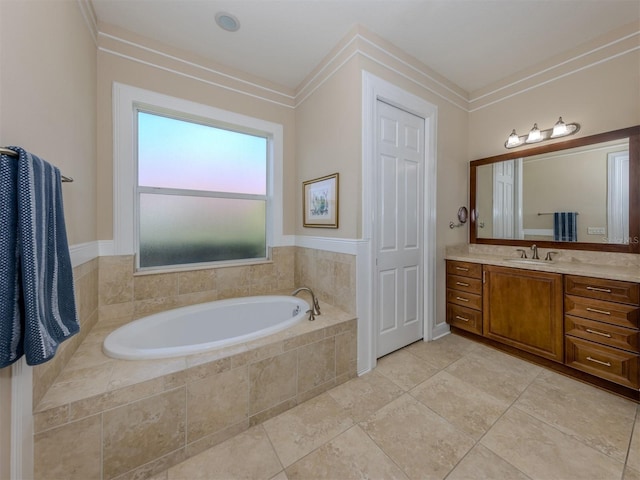 bathroom featuring tile patterned flooring, vanity, a relaxing tiled tub, and ornamental molding