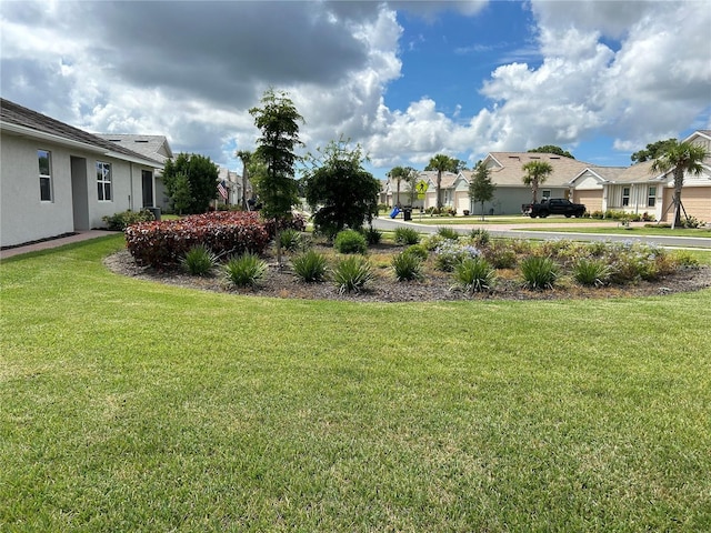 view of yard with a residential view