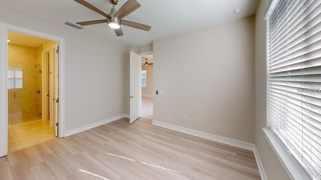 unfurnished bedroom featuring ceiling fan and light hardwood / wood-style flooring