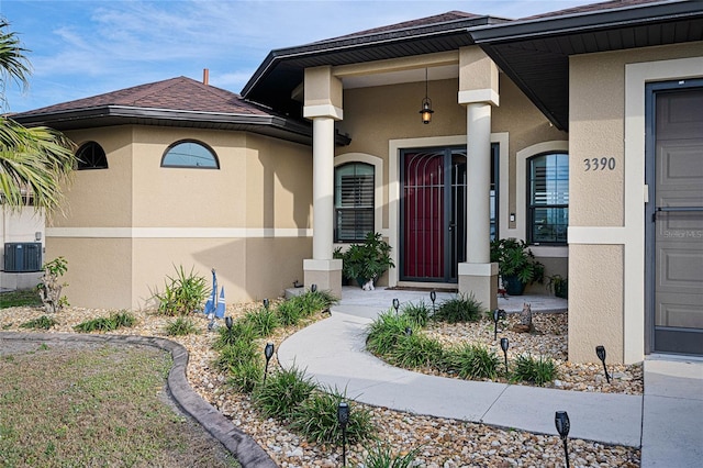 entrance to property with central AC unit